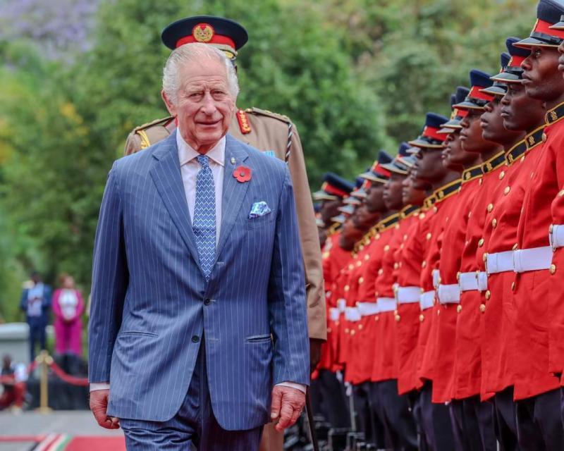 King Charles III inspecting a guard of honour at State House.